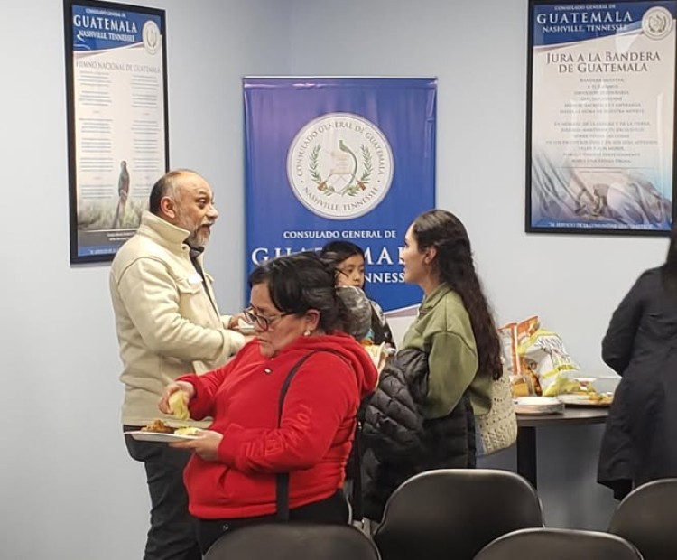 People talking at the Guatamalan Consulate