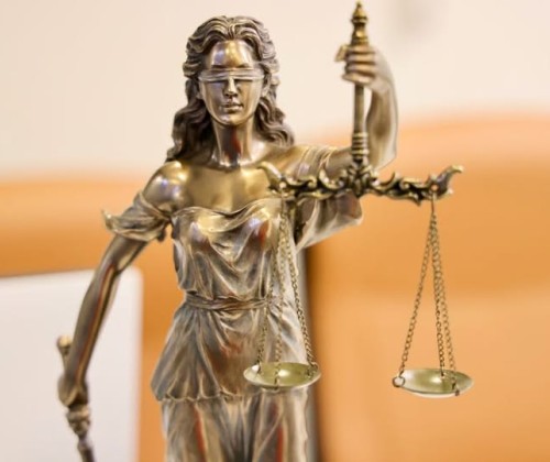 brass statue of Justice