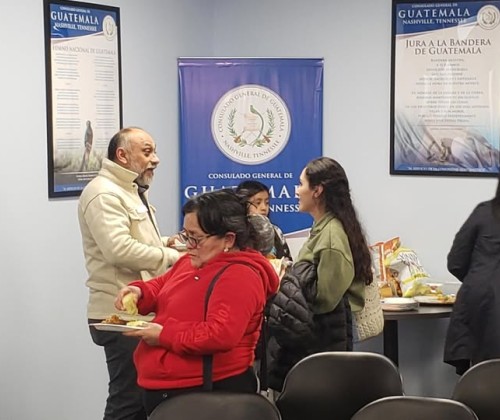 People talking at the Guatamalan Consulate